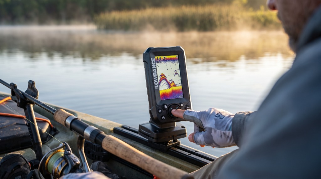 Dr. Eric Lindner field testing the Lowrance Eagle 4X Fish Finder mounted on a kayak rail during morning reservoir testing