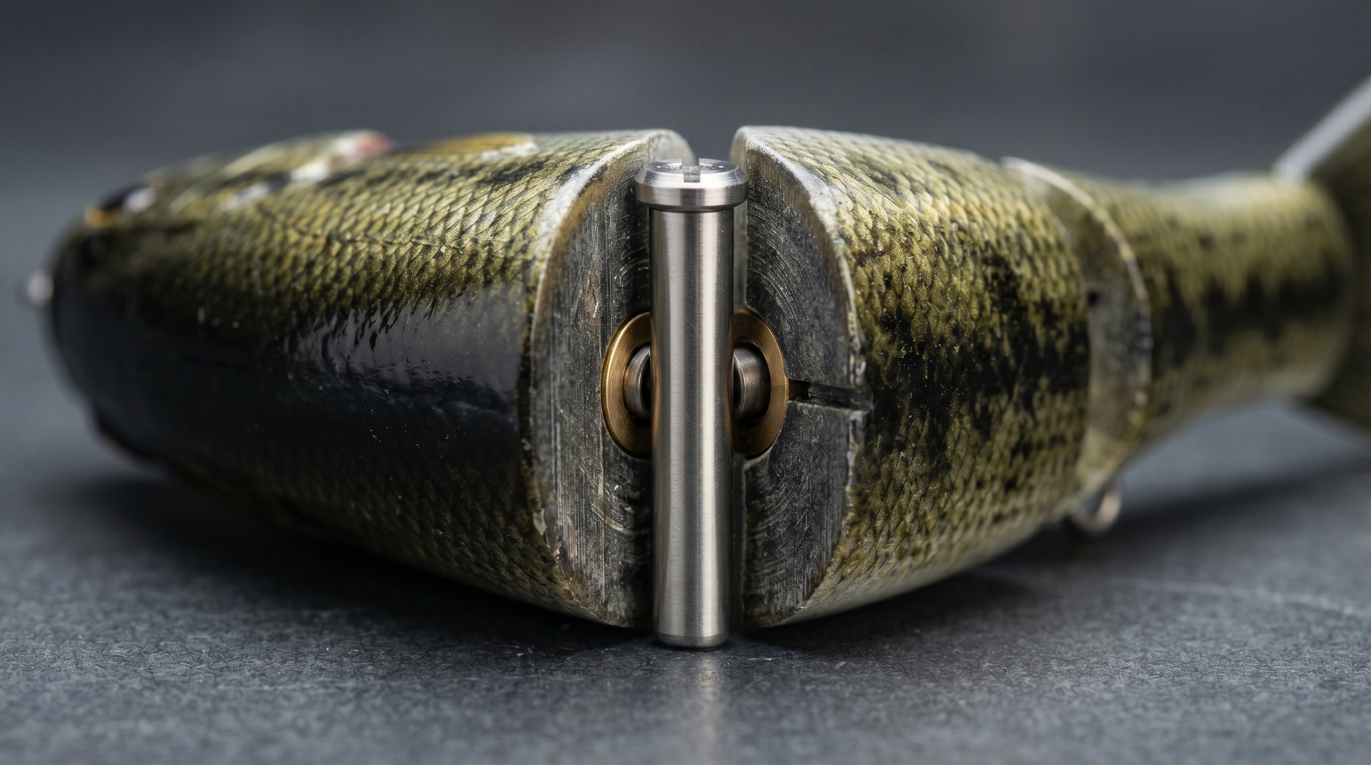 Close-up detail of the Spro BBZ-1 Rat hinge joint and composite resin body